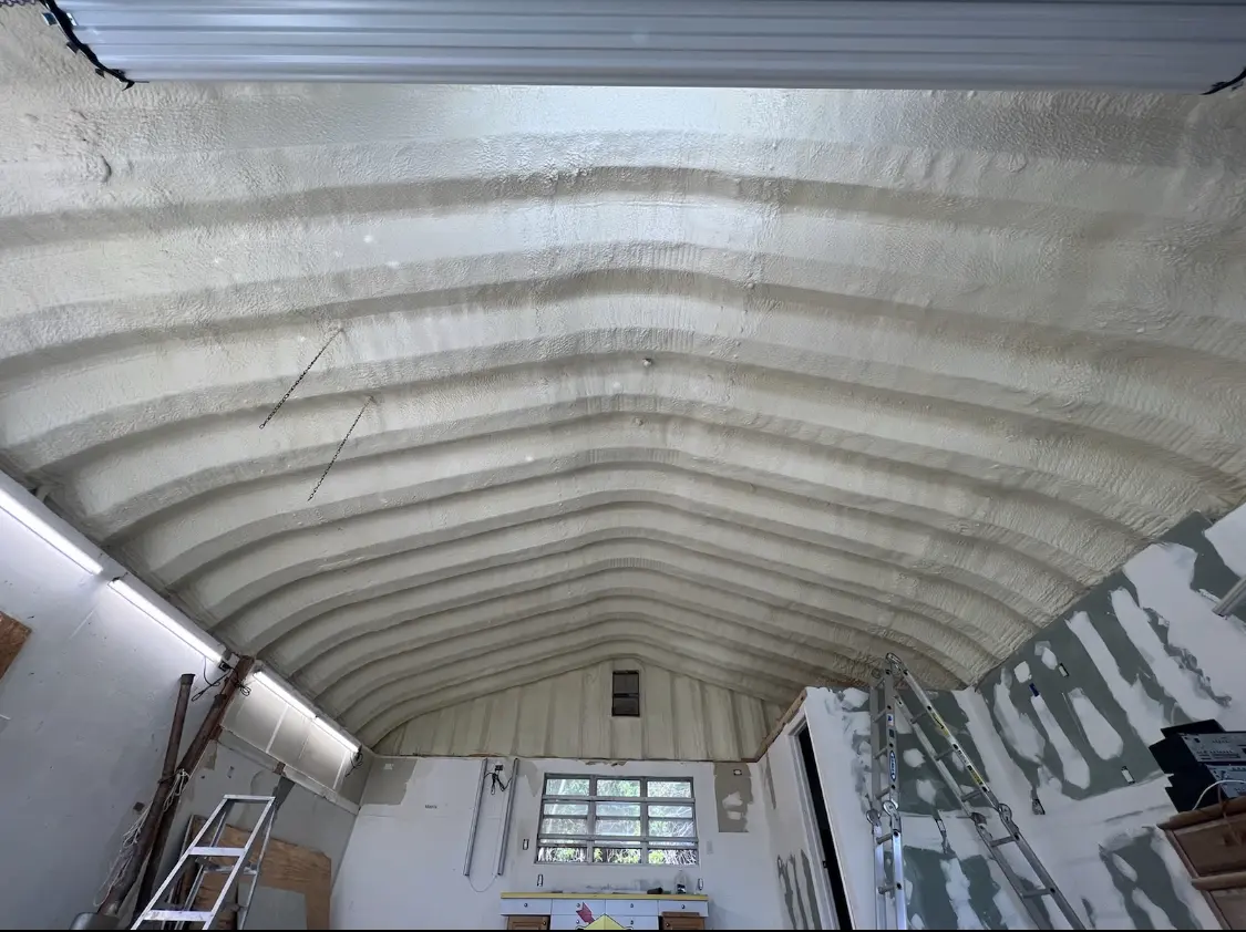 Spray polyurethane foam applied to the underside of a metal roof deck in Straban